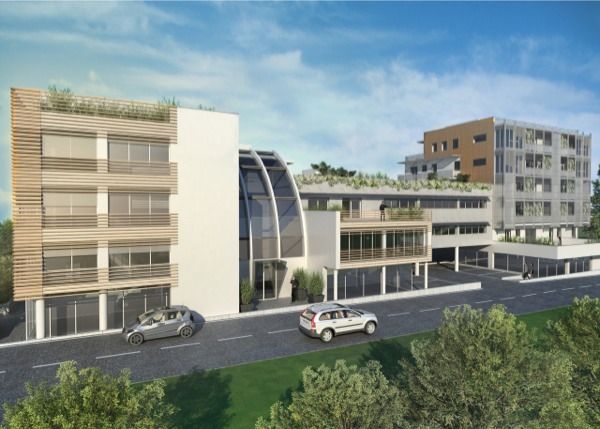Progetto di edificio terziario e residenziale plurifamiliare in bioedilizia realizzato da Fulvio Miatello, a Vedano Olona